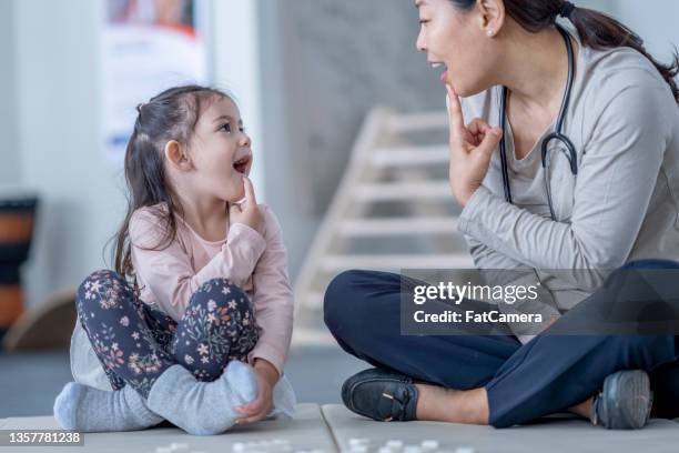 Slp Working 586 Speech Language Pathologist Day Stock Photos, High-Res Pictures ...