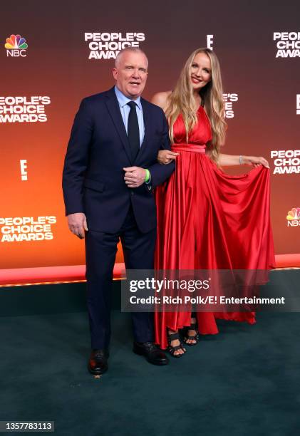 Pictured: Anthony Michael Hall and Lucia Oskerova arrive to the 2021 People's Choice Awards held at Barker Hangar on December 7, 2021 in Santa...