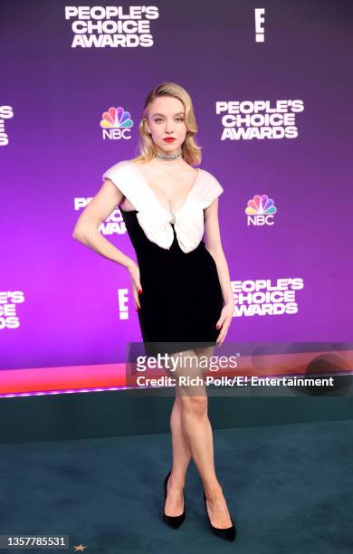 Pictured: Sydney Sweeney arrives to the 2021 People's Choice Awards held at Barker Hangar on December 7, 2021 in Santa Monica, California.