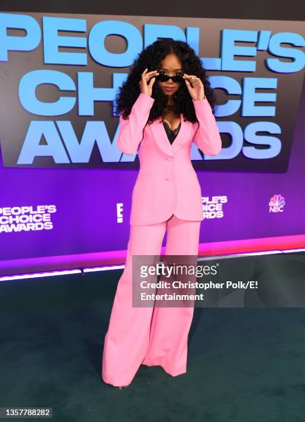 Pictured: H.E.R. Arrives to the 2021 People's Choice Awards held at Barker Hangar on December 7, 2021 in Santa Monica, California.