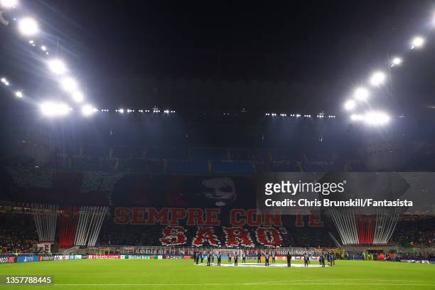 Milan fans display a giant banner ahead of the UEFA Champions League group B match between AC Milan and Liverpool FC at Giuseppe Meazza Stadium on...