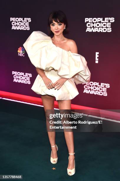 Pictured: Sarah Hyland arrives to the 2021 People's Choice Awards held at Barker Hangar on December 7, 2021 in Santa Monica, California.