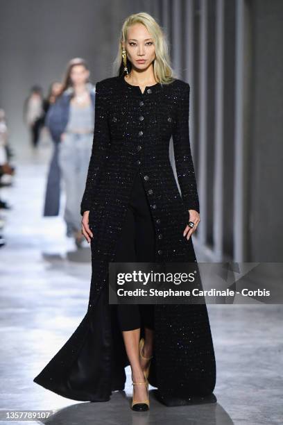 Soo Joo Park walks the runway during the Chanel Metiers D'Art 2021-2022 show at Le 19M on December 07, 2021 in Paris, France.