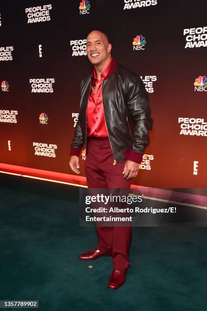 Pictured: Dwayne Johnson arrives to the 2021 People's Choice Awards held at Barker Hangar on December 7, 2021 in Santa Monica, California.