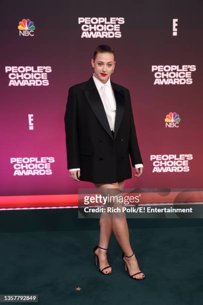 Pictured: Lili Reinhart arrives to the 2021 People's Choice Awards held at Barker Hangar on December 7, 2021 in Santa Monica, California.