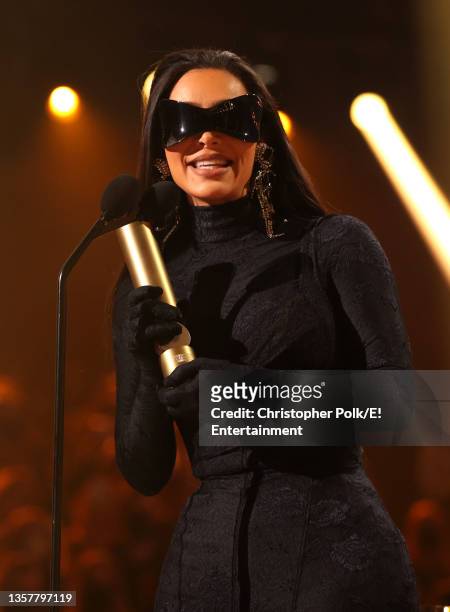 Pictured: Kim Kardashian West accepts the Fashion Icon of 2021 award on stage during the 2021 People's Choice Awards held at Barker Hangar on...