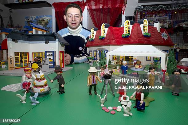 One of the founder of French society "Klikobil", Olivier Boulanger, poses in his shop on December 14, 2011 in Dremil-Lafage near Toulouse. Klikobil...
