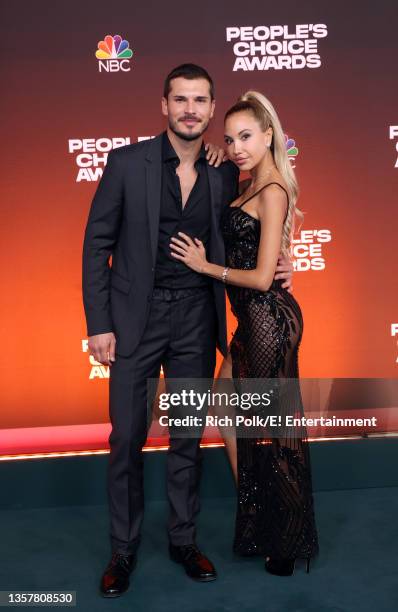 Pictured: Gleb Savchenko and Elena Belle arrive to the 2021 People's Choice Awards held at Barker Hangar on December 7, 2021 in Santa Monica,...