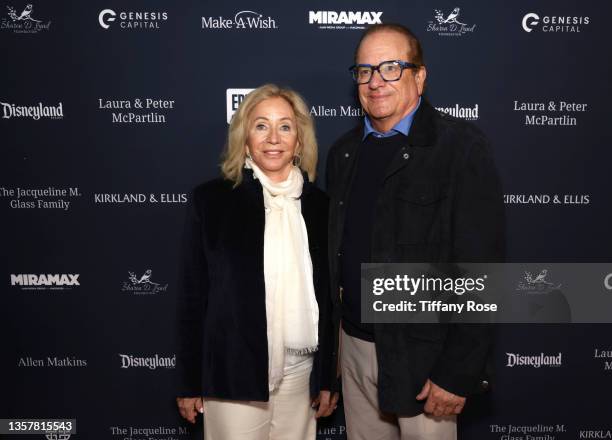 Susie Spanos and Dean Spanos attend Galaxy of Wishes: A Night to Benefit Make-A-Wish at Disneyland on December 07, 2021 in Anaheim, California.