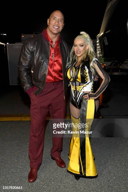 Dwayne Johnson and Christina Aguilera attend the People's Choice Awards at Barker Hangar on December 07, 2021 in Santa Monica, California.