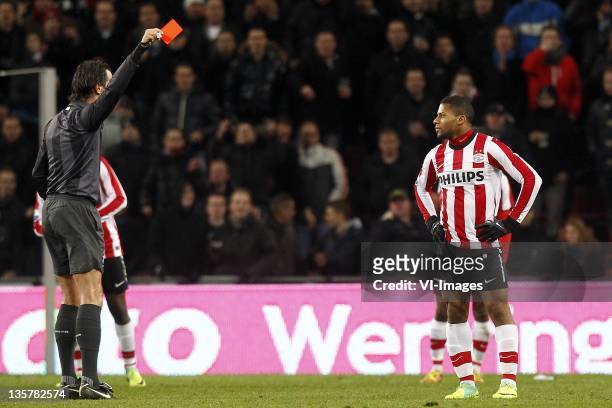 Jeremain Lens of PSV ,referee Bas Nijhuis during the Eredivisie match between PSV Eindhoven and NAC Breda at the Philips stadium on December 10, 2011...