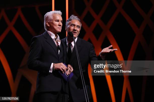 Baz Luhrmann and Taika Waititi prese during the 2021 AACTA Awards Presented by Foxtel Group at the Sydney Opera House on December 08, 2021 in Sydney,...