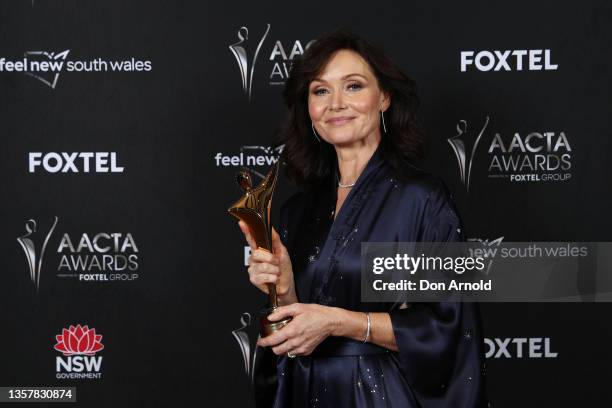 Essie Davis poses with the AACTA Award for Best Supporting Actress in the media room during the 2021 AACTA Awards Presented by Foxtel Group at the...