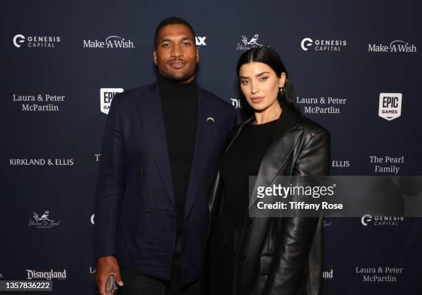 Larry English and Nicole Williams English attend Galaxy of Wishes: A Night to Benefit Make-A-Wish at Disneyland on December 07, 2021 in Anaheim,...