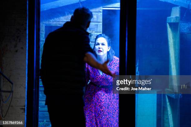 Elliot Cowan and Giovanna Fletcher during a photocall for "2:22: A Ghost Story" at Gielgud Theatre on December 08, 2021 in London, England.