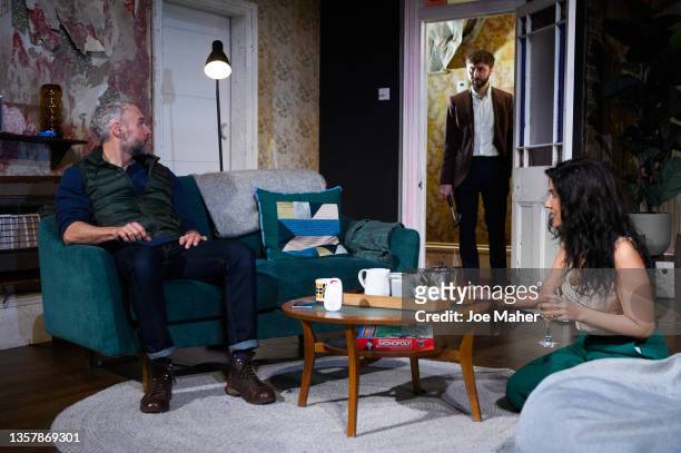 Elliot Cowan, James Buckley and Stephanie Beatriz during a photocall for "2:22: A Ghost Story" at Gielgud Theatre on December 08, 2021 in London,...