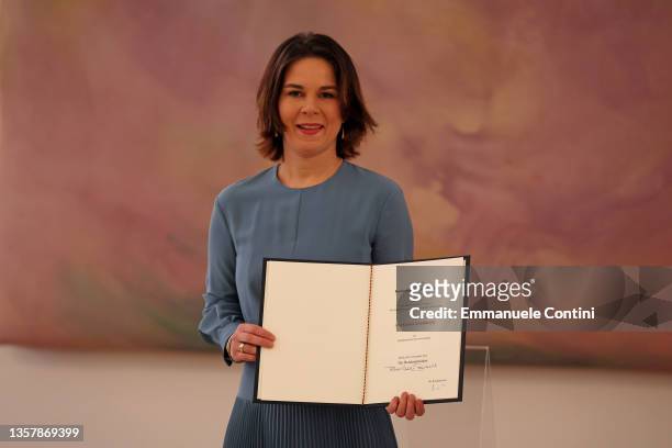 New German Foreign Minister Annalena Baerbock holds her certificate of appointment at Bellevue palace on December 8, 2021 in Berlin, Germany. The new...