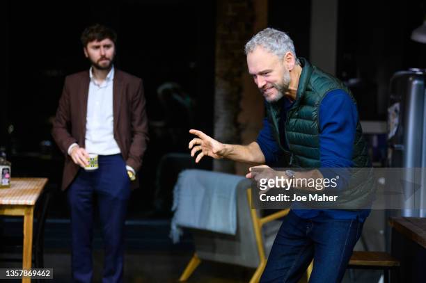 James Buckley and Elliot Cowan during a photocall for "2:22: A Ghost Story" at Gielgud Theatre on December 08, 2021 in London, England.