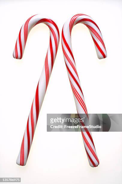 twin candy canes - candy cane stock pictures, royalty-free photos & images