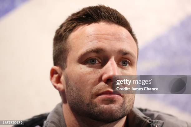 Josh Taylor looks on during the Josh Taylor v Jack Catterall press conference at The Sports Direct Flagship store on December 08, 2021 in London,...