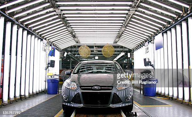 Ford Focus goes through quality inspection on the assembly line at Ford Motor Co.'s Michigan Assembly Plant December 14, 2011 in Wayne, Michigan....