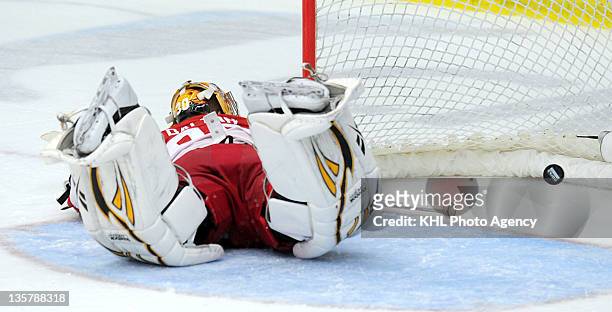 Goalie Matt Dalton of the Vityaz fails to stop a shot during the game between Dinamo Minsk and Atlant Moscow region during the KHL Championship...