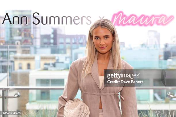 Molly-Mae Hague attends the Maura Higgins Ann Summers Christmas event on December 08, 2021 in London, England.