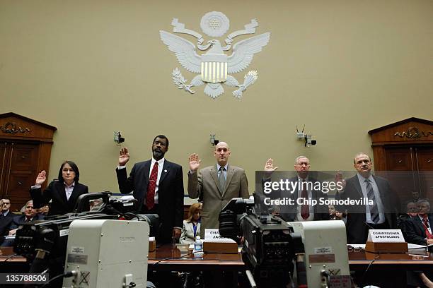 Nuclear Regulatory Commission Chairman Chairman Gregory Jaczko is sworn in with fellow commissioners Kristine Svinicki, William Magwood IV, William...