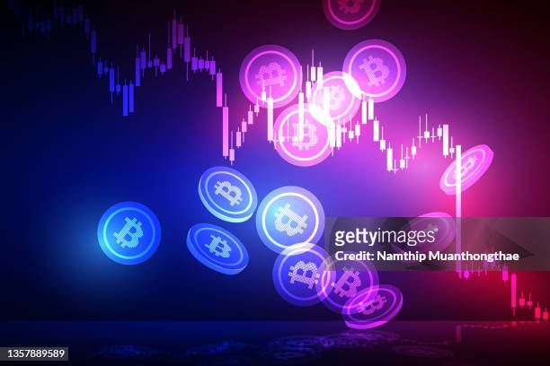 falling down cryptocurrency illustration concept shows the graph falling down with the symbol of bitcoin that shine on the dark background for creating the financial background. - bitcoin stock pictures, royalty-free photos & images