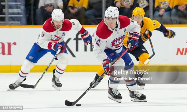 Nick Suzuki of the Montreal Canadiens skates against the Nashville Predators during an NHL game at Bridgestone Arena on December 4, 2021 in...