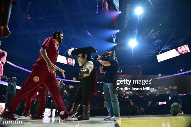 Ricky Rubio of the Cleveland Cavaliers celebrates with teammates during player introductions prior to the game against the Boston Celtics at Rocket...