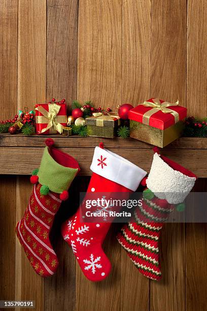 christmas stockings - christmas stocking stock pictures, royalty-free photos & images