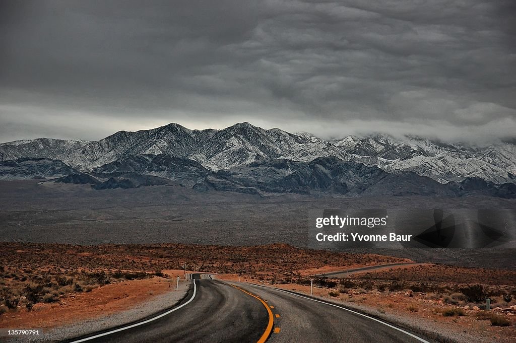 Lonely road into winter storm