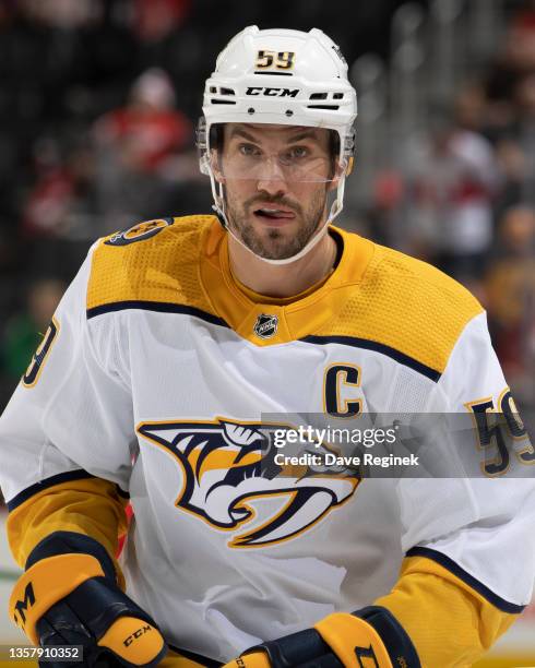 Roman Josi of the Nashville Predators skates up ice against the Detroit Red Wings during the first period of an NHL game at Little Caesars Arena on...