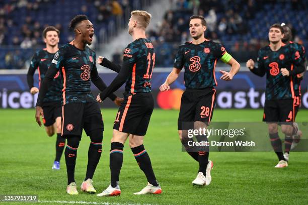Timo Werner of Chelsea celebrates with teammates Callum Hudson-Odoi and Cesar Azpilicueta after scoring their side's first goal during the UEFA...