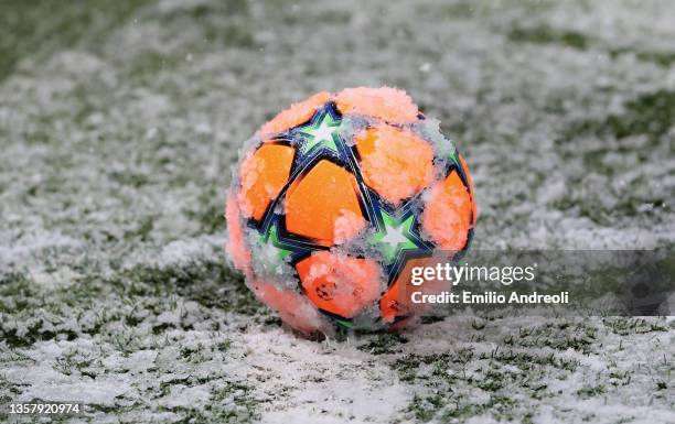General view of the orange winter Adidas match ball on the pitch in the snow prior to the UEFA Champions League group F match between Atalanta and...