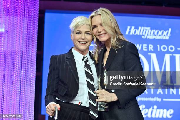 Honoree Selma Blair accepts the Equity in Entertainment Award from Michelle Pfeiffer onstage during The Hollywood Reporter 2021 Power 100 Women in...