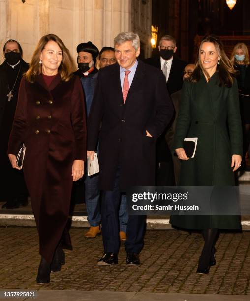 Carole Middleton, Michael Middleton and Pippa Middleton attend the "Together at Christmas" community carol service on December 08, 2021 in London,...