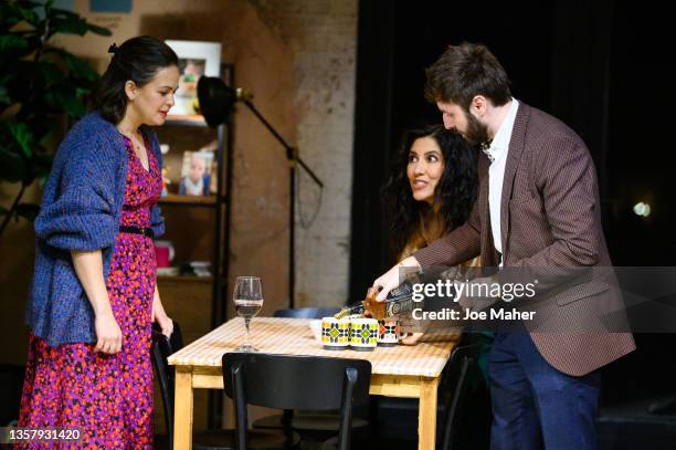 Giovanna Fletcher, Stephanie Beatriz and James Buckley pose during a photocall for "2:22: A Ghost Story" at Gielgud Theatre on December 08, 2021 in...