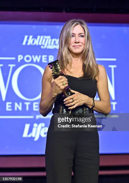 Honoree Jennifer Aniston accepts the Sherry Lansing Leadership Award onstage at The Hollywood Reporter 2021 Power 100 Women in Entertainment,...