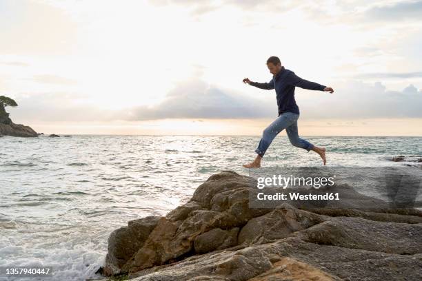Leap Over Rocks 694 Jump Over Rocks Stock Photos, High-Res Pictures, and Images - Getty ...