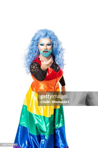 drag queen with rainbow dress against background - drag queen fotografías e imágenes de stock