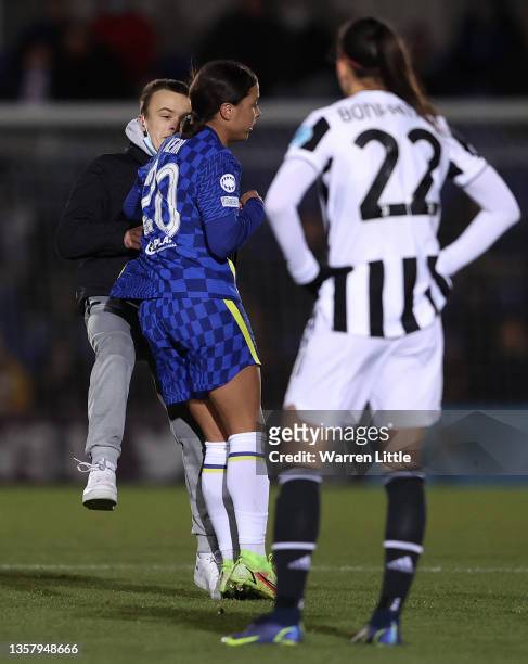 Pitch invader collides with Sam Kerr of Chelsea during the UEFA Women's Champions League group A match between Chelsea FC and Juventus at Kingsmeadow...
