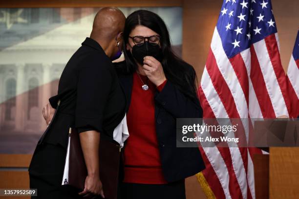 Rep. Rashida Tlaib is comforted by Rep. Ayanna Pressley during a news conference at the U.S. Capitol December 8, 2021 in Washington, DC. House...