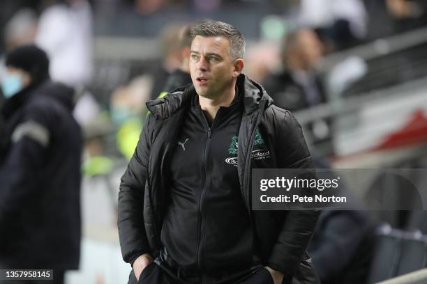 Plymouth Argyle manager Steven Schumacher loos on prior to the Sky Bet League One match between Milton Keynes Dons and Plymouth Argyle at Stadium mk...
