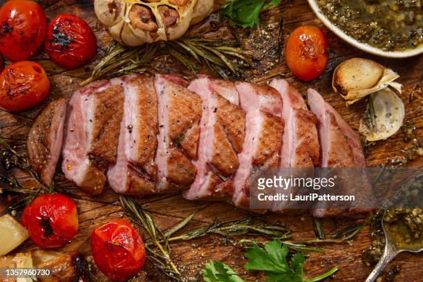 crispy pan seared  duck breast with basil and cilantro pesto - sears canada stock pictures, royalty-free photos & images