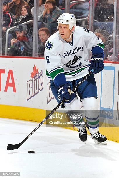 Sami Salo of the Vancouver Canucks skates with the puck against the Columbus Blue Jackets on December 13, 2011 at Nationwide Arena in Columbus, Ohio....