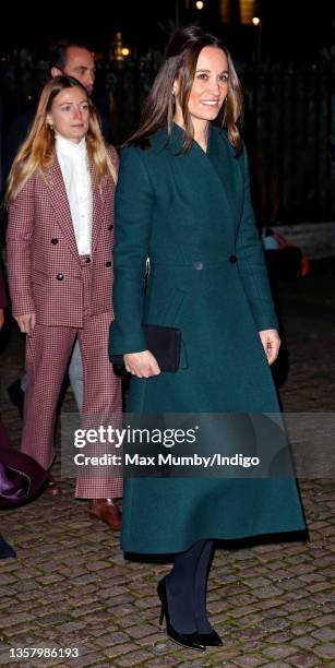 Alizee Thevenet and Pippa Middleton attend the 'Together at Christmas' community carol service at Westminster Abbey on December 8, 2021 in London,...