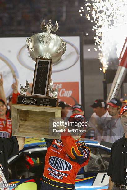 Jeff Gordon celebrates in victory lane after winning the NASCAR Winston Cup Series Sharpie 500 on August 24, 2002 at the Bristol Motor Speedway in...