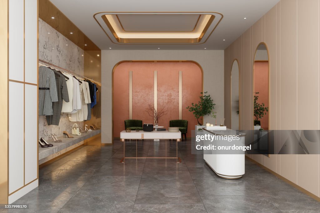 Interieur des Luxusbekleidungsgeschäfts mit Kleidung, Schuhen und anderen persönlichen Accessoires